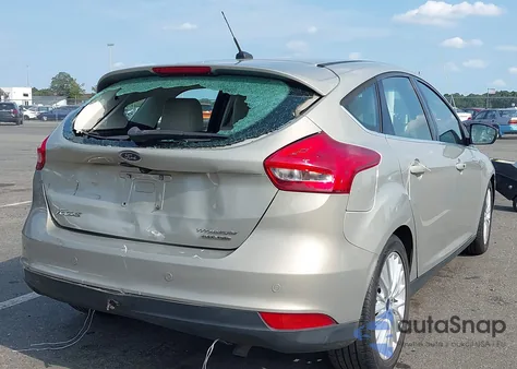 2016 Ford Focus Titanium z USA, uszkodzony, nr VIN 1FADP3N22GL205374